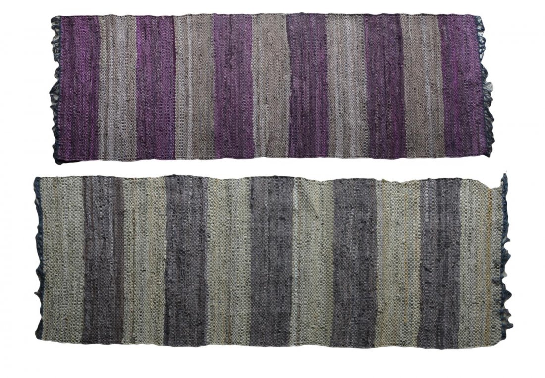 (2) LEATHER RAG RUG RUNNERS: (lot of 2) Leather rag rug runners, one with alternating tones of purple and tans, the other greys and tans, largest: 6'9.5"l, 2'3"w (inclusive of fringe), 10.25lbs Start Price: $80.00