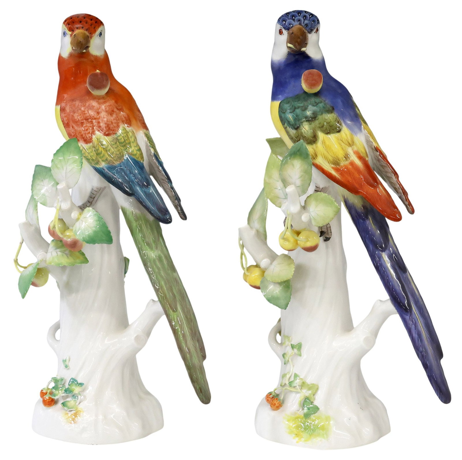 (2) GERMAN MEISSEN PORCELAIN PARROTS WITH CHERRIES, 12.5"H: (lot of 2) German Meissen porcelain figures, Parrot with Cherries, after the models by J.J. Kaendler (Johann Joachim Kandler, German, 1706-1775), each bird perched in a tree bearing cherries with stra