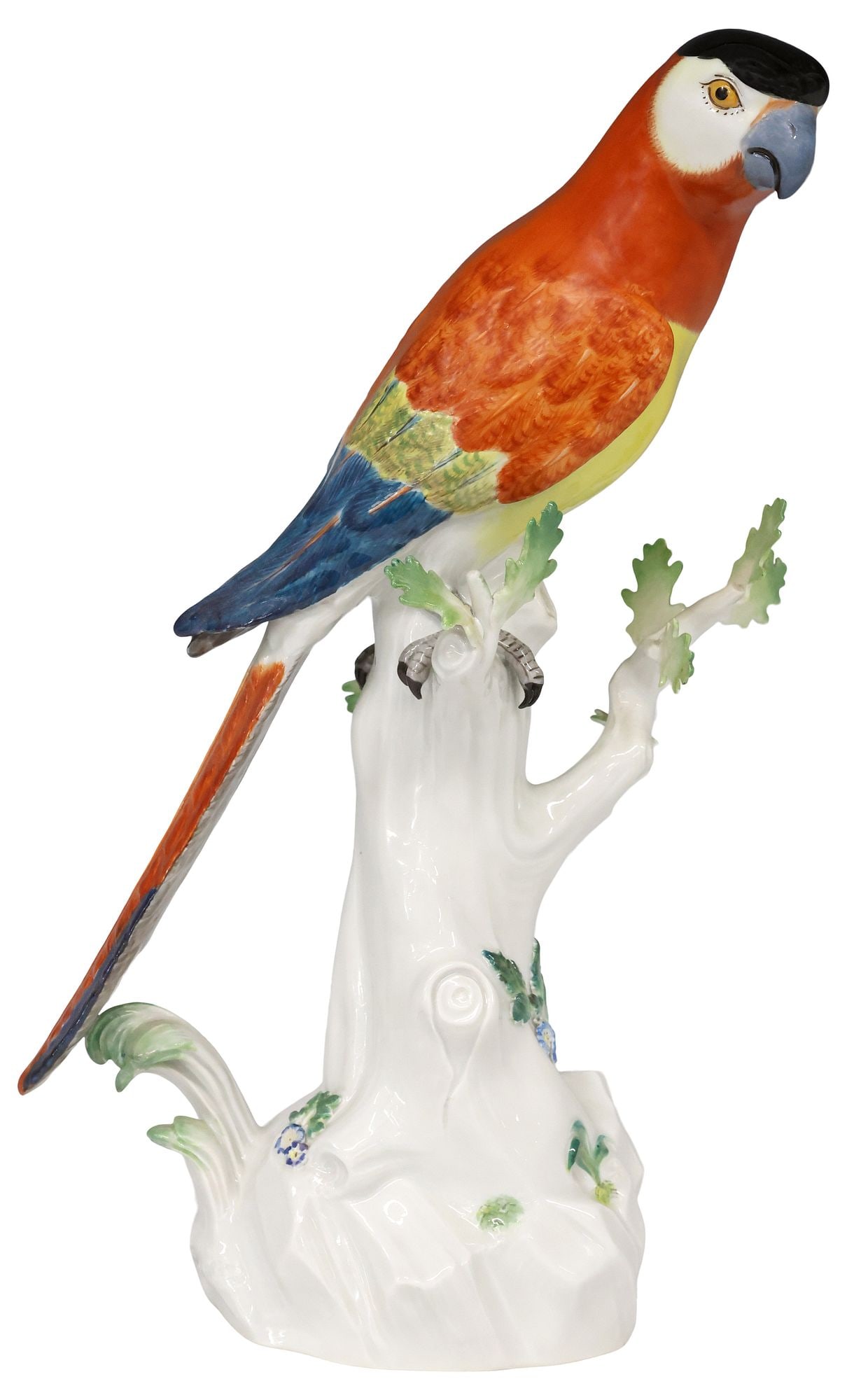 LARGE GERMAN MEISSEN PORCELAIN BLACK-CAPPED PARROT ON STUMP: German Meissen porcelain figure, Parrot on a Stump, after the models by J.J. Kaendler (Johann Joachim Kandler, German, 1706-1775), black-capped bird with red, yellow, and blue plumage, perched atop a 
