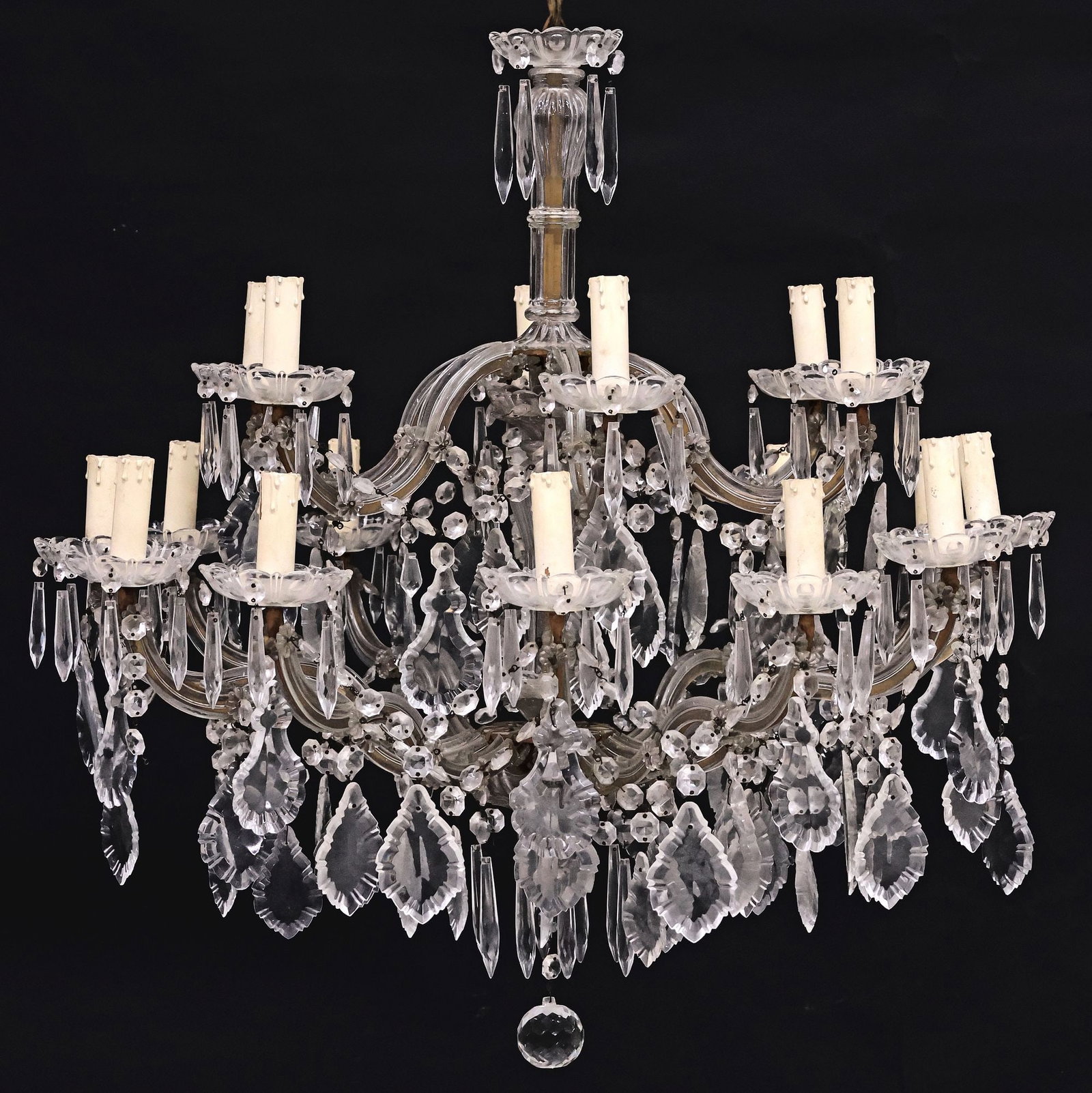 ITALIAN MARIA THERESA STYLE GLASS-CLAD & CRYSTAL 18-LIGHT CHANDELIER: Italian Maria Theresa style eighteen-light chandelier, 20th c., glass-clad scrolled metal frame with turned central standard, hung with crystal beaded swags, prisms, and pendalogues, arms terminating 