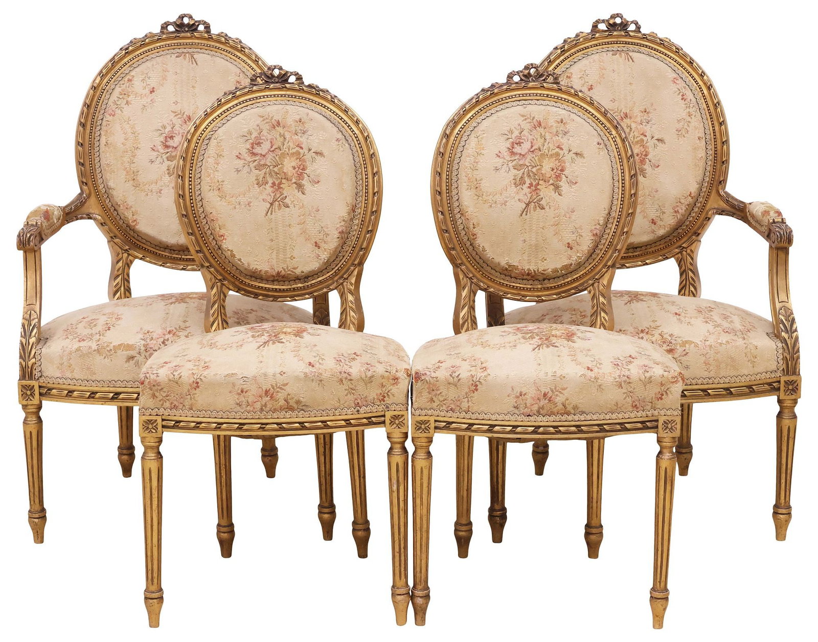 (4) FRENCH LOUIS XVI STYLE UPHOLSTERED GILTWOOD SALON CHAIRS: (lot of 4) French Louis XVI style giltwood salon chairs, late 19th c., each having oval medallion back and padded seat, in floral-patterned upholstery, rising on tapering fluted legs, comprising: (pai