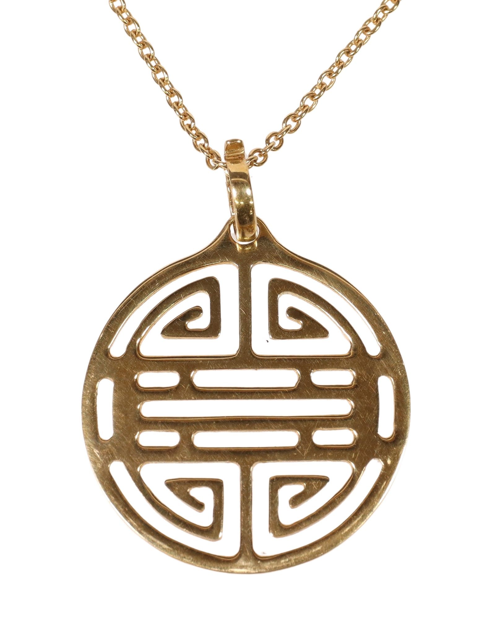 ESTATE L. KLEIN 18KT YELLOW GOLD 'LABYRINTH' PENDANT NECKLACE: Estate designer 18kt yellow gold "Labyrinth" pendant necklace, Lauren Klein Jewelry, pierced pendant in the form of the Chinese "Shou" (Longevity) symbol, on cable chain, with lobster claw clasp, pend