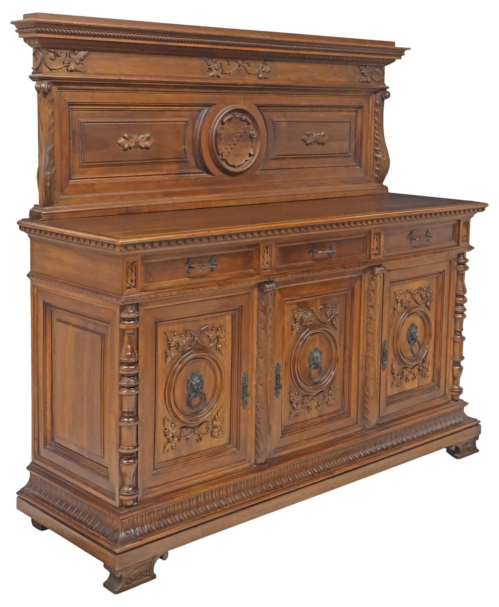 ITALIAN RENAISSANCE REVIVAL CARVED WALNUT SIDEBOARD: Italian Renaissance Revival carved walnut sideboard, 19th c., having molded cornice with rope trim, over paneled back with grape vine frieze and central shield, case fitted with three drawers, above t