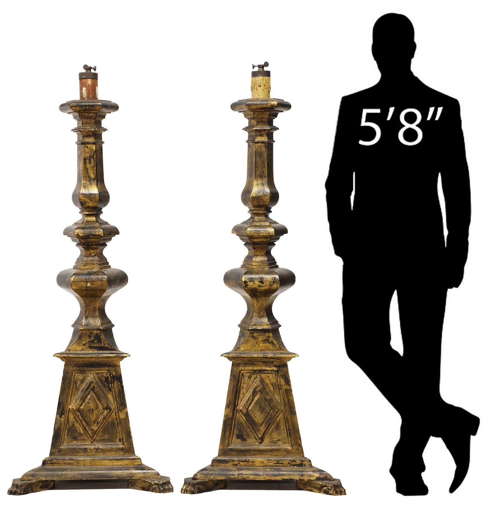 (2) LARGE SPANISH BAROQUE STYLE ALTAR CANDLE PRICKETS / TORCHERES, 61"H: (pair) Large Spanish Baroque style giltwood single-light floor altar prickets, 19th c./ early 20th c., now as floor lamps, each having baluster form standard, paneled base with central diamond, ending