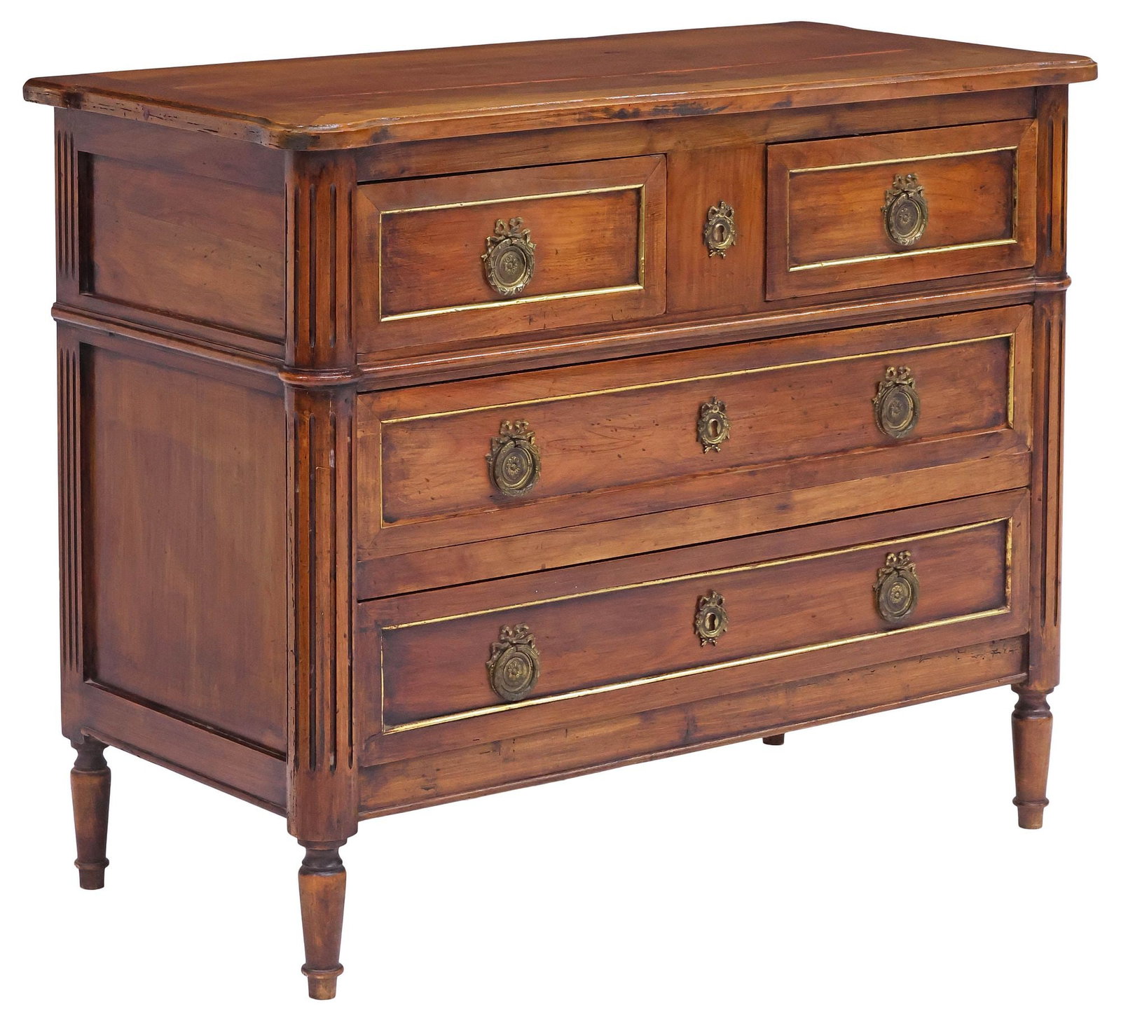 FRENCH LOUIS XVI STYLE WALNUT 4-DRAWER COMMODE: French Louis XVI style walnut commode, 19th c., having shaped top, over four brass-trimmed drawers, flanked by fluted corner posts, rising on tapering legs and arrow feet, fill repair to top, approx 3