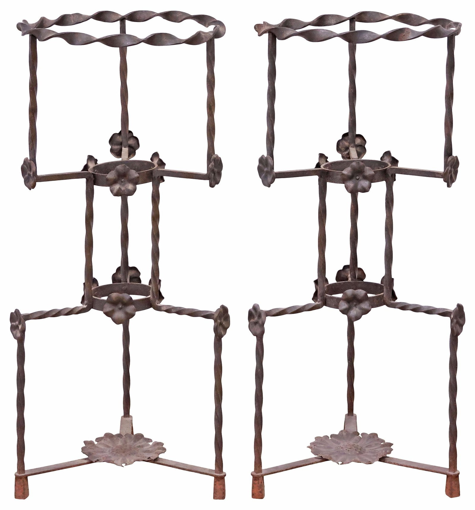 (2) SPANISH TWISTED WROUGHT IRON GARDEN PLANTER STANDS, 38"H: (pair) Spanish wrought iron planter stands, early 20th c., each having twisted circular frame with applied floral motifs, on tripartite base, approx 38"h, 16.5"diam **PLEASE NOTE: All of the cast ston