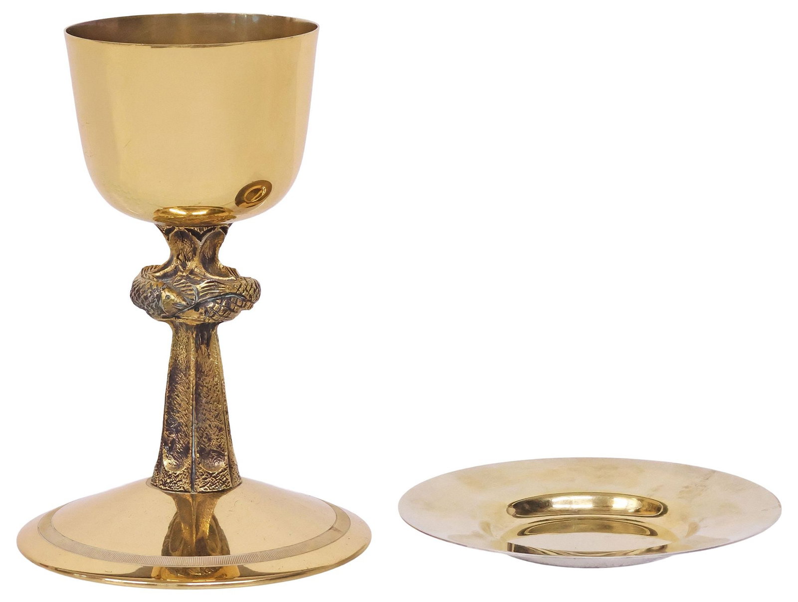 (2) LITURGICAL GILT-METAL COMMUNION SET, SWIFT & FISHER CHALICE AND WELL PATEN: (lot of 2) Modernist gilt-metal communion set, mid 20th c., comprising: (1) chalice, Swift and Fisher Company, having paneled standard with overlapping fish motifs, on circular foot with fluted trim, 