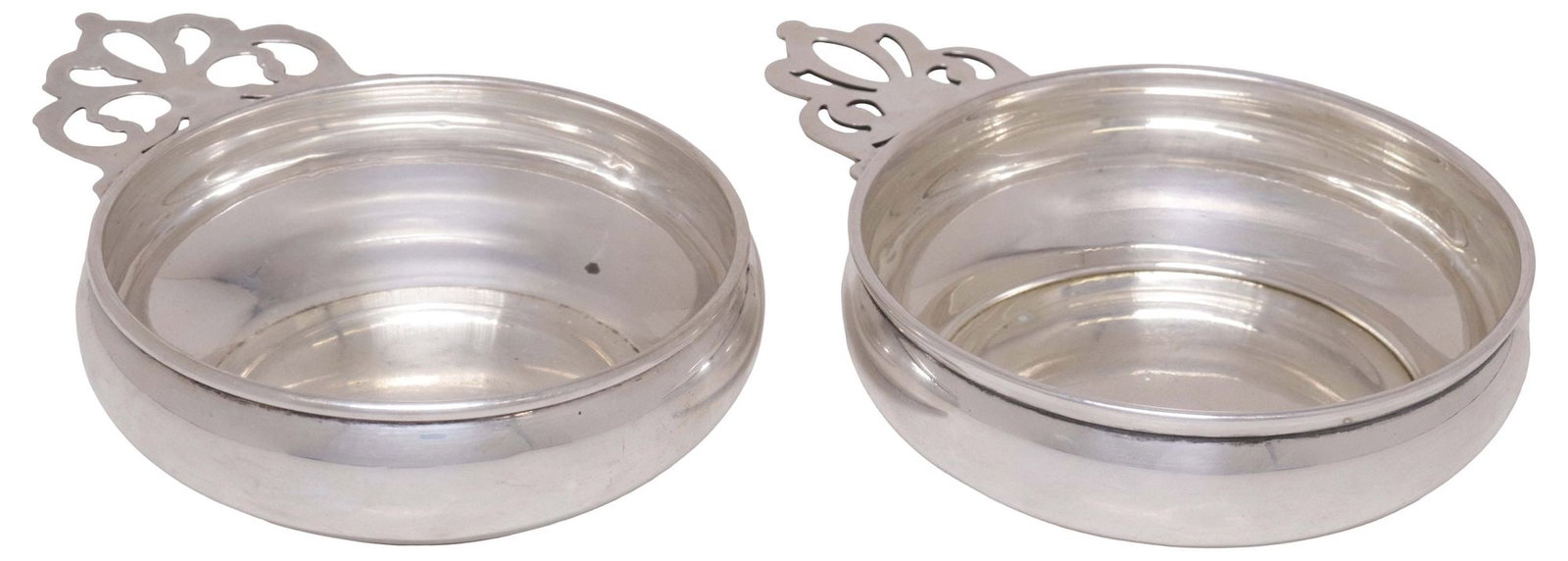 (2) AMERICAN STERLING SILVER PORRINGERS, FISHER & LUNT SILVERSMITHS: (lot of 2) American sterling silver porringers, each having pierced handle, hallmarked sterling with maker's mark underfoot, no observed monograms, including: (1) Fisher, numbered 6875, approx 1.25"h,