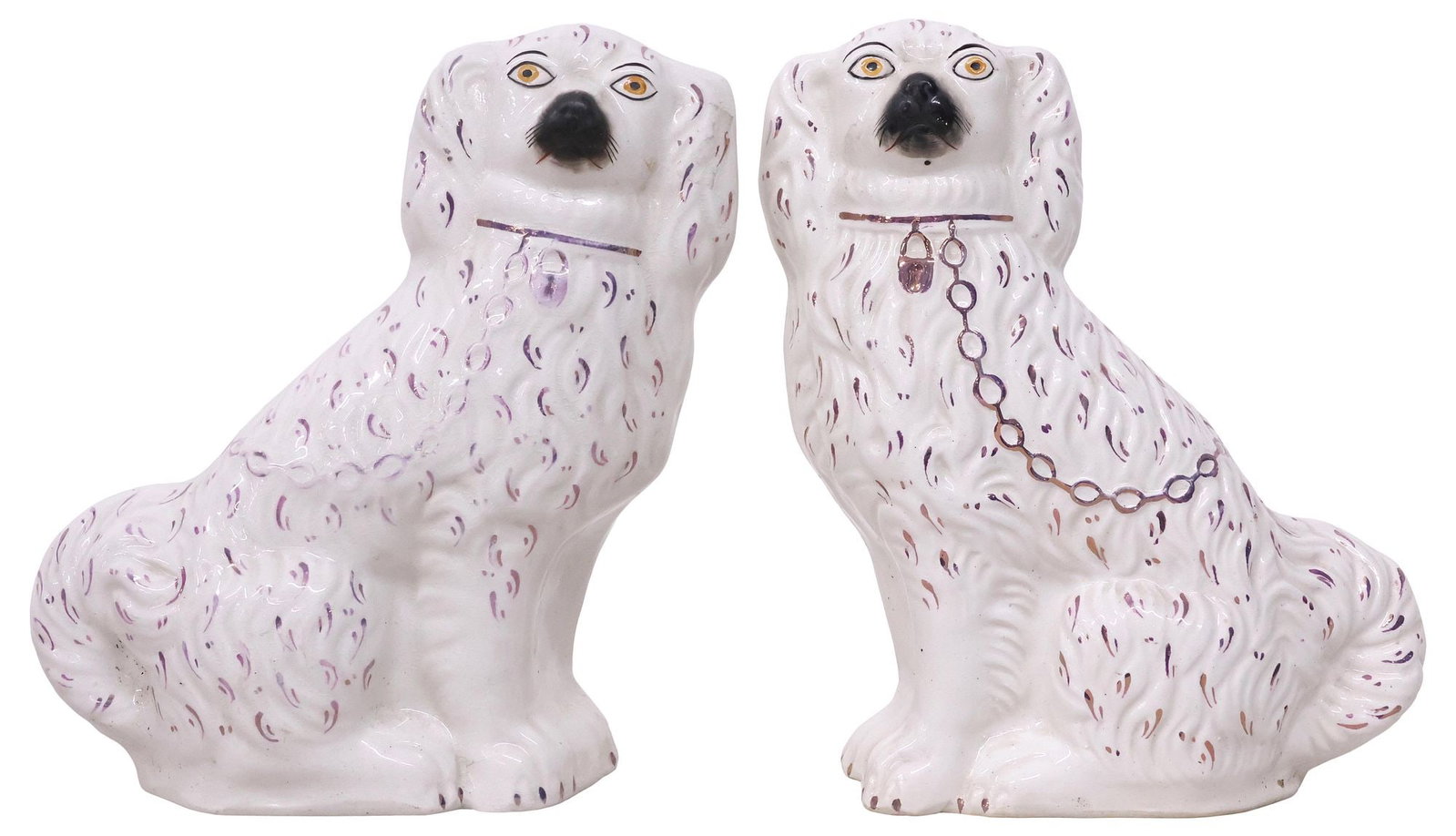 (2) ENGLISH VICTORIAN STAFFORDSHIRE PURPLE LUSTER MANTEL DOGS: (pair) English Victorian Staffordshire mantel dogs, late 19th c., each modeled as a seated spaniel, with painted features, and lavender luster glazed decoration, (one) intact with minor stable hairlin