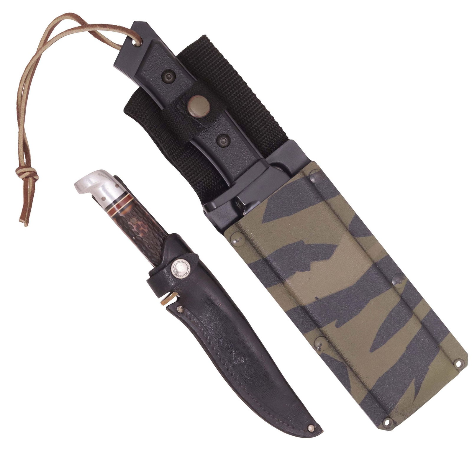 (2) KNIVES: SPECTRE MOUNTAINPIG & 1960'S WESTERN, FIXED BLADES: (lot of 2) Fixed Blade Knives: (1) Spectre Products U.S.A. Mountainpig survival knife, the 6.25" black coated needle point blade with serrations at spine, a drop end guard, the full tang with black