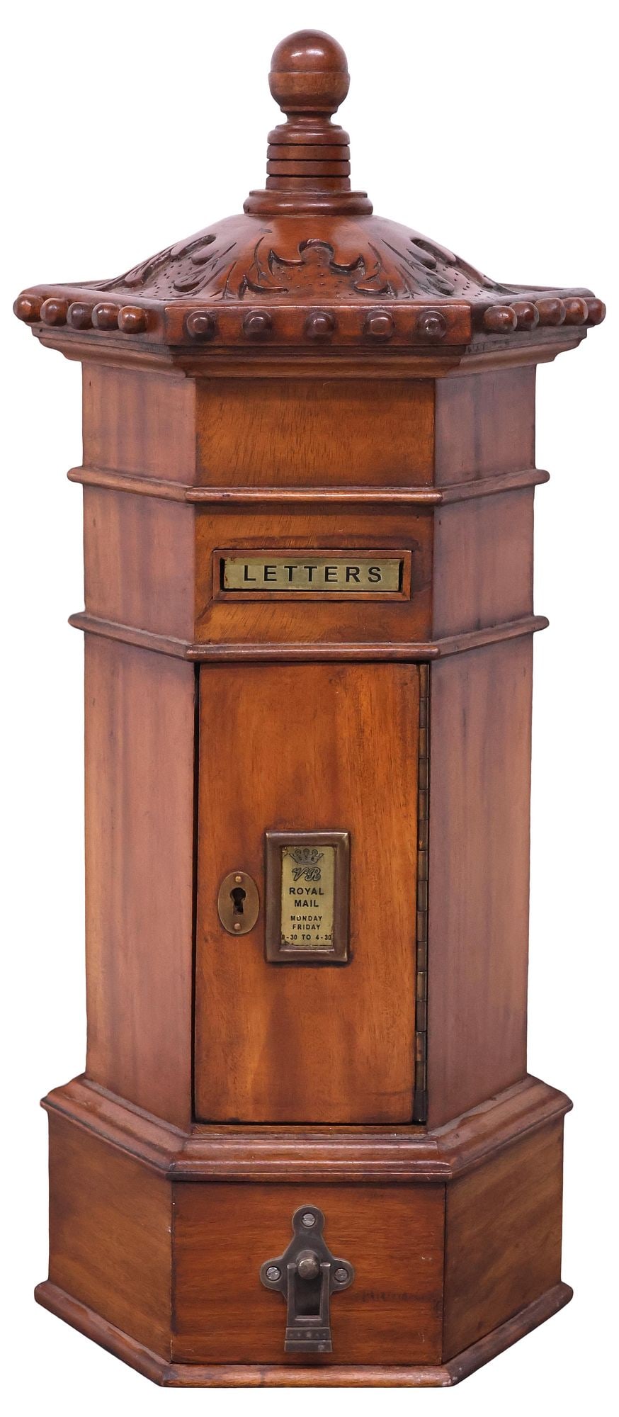 ENGLISH CARVED MAHOGANY PILLAR-FORM LETTER BOX: English mahogany letter box, late 20th/ 21st c., of pillar form, domed cover with finial and foliate carving, hexagonal case with brass "Letters" slot and "VR Royal Mail" plaque on the door, open inte
