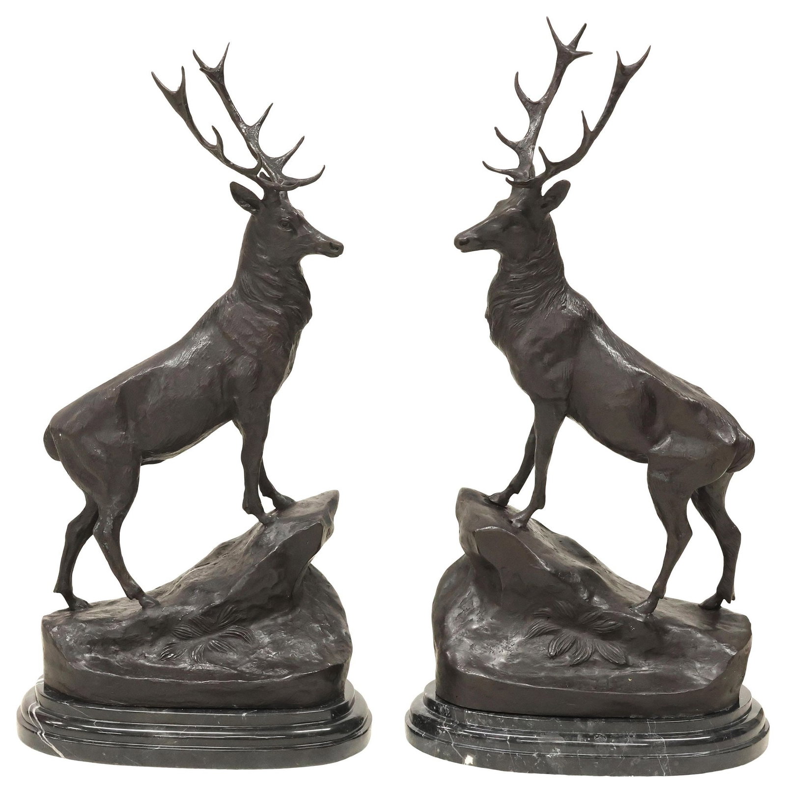 (2) AFTER JULES MOIGNIEZ PATINATED BRONZE STAGS: (pair) Large patinated bronze sculptures, signed in cast after Jules Moigniez (French, 1835-1894), depicting stag standing over naturalistic rocky outcrop, on stepped marble plinth, approx 29"h, 15"w,