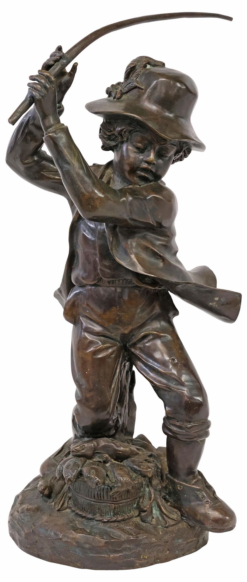 MANNER OF AUGUSTE MOREAU BRONZE SCULPTURE, YOUNG FISHERMAN: Patinated bronze sculpture, The Young Fisherman, in the style of Auguste Moreau (French, 1834-1917), modeled as a boy with fishing rod held above head, standing atop basket of fish, on integral
