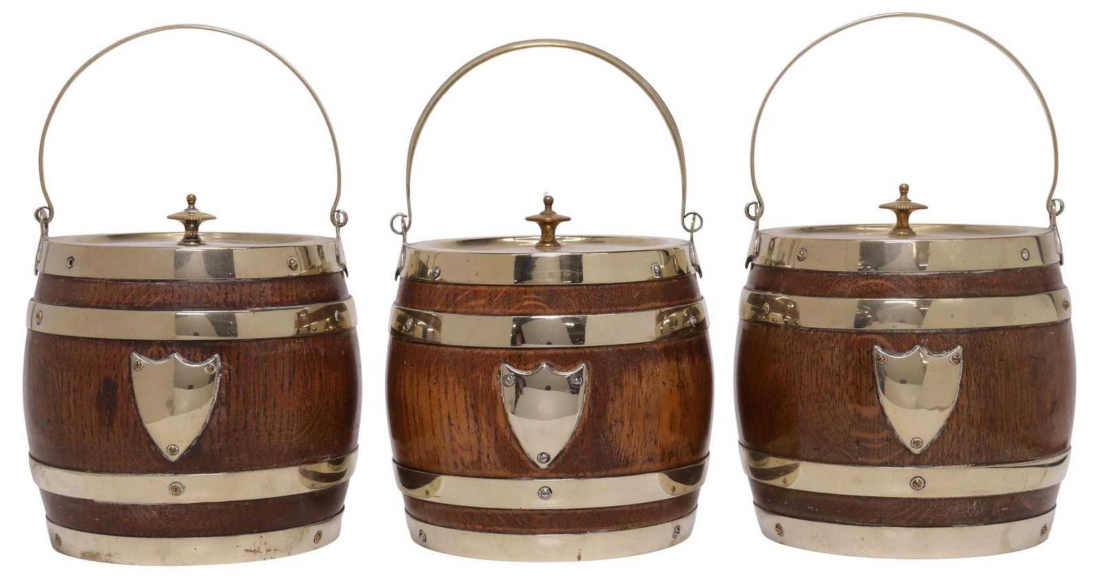 (3) ENGLISH DANIEL & ARTER SILVERPLATE-MOUNTED OAK BISCUIT BARRELS: (lot of 3) English coopered oak biscuit barrels, late 19th/ early 20th c., each having Daniel and Arter silverplate mounts, with circular cover and bail handle, central blank shield-form cartouche,