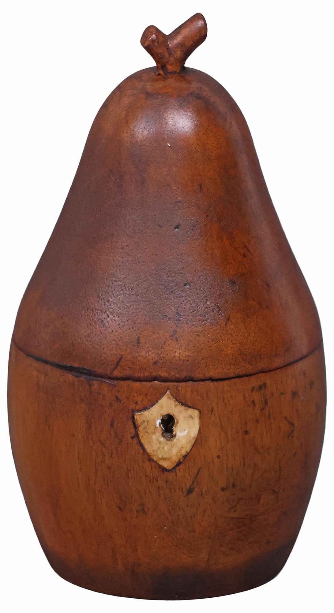 ENGLISH GEORGE III STYLE CARVED PEAR-FORM TEA CADDY: English George III style pear-form tea caddy, late 20th c., in the form of a pear, inlaid shield form escutcheon, foil-lined interior, approx 7.75"h, 4"w, 4"d, 1lb