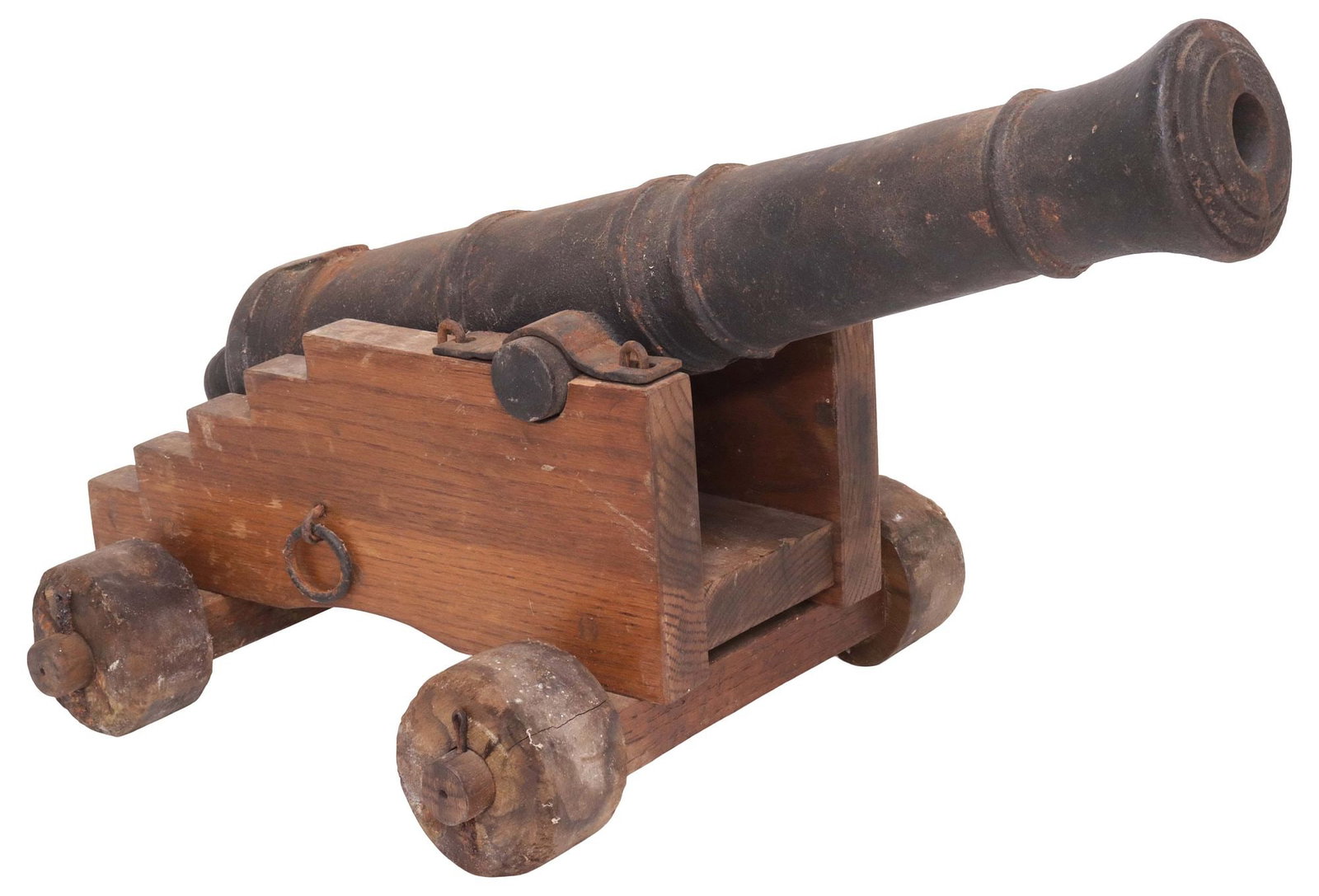 LARGE CAST IRON 21" SIGNAL CANNON & CARRIAGE: Cast iron signal cannon, 19th/20th c., removable from the wood carriage, the 21" barrel approx. 4" diam. at the base ring, an open touch hole, several reinforcing rings, an obscured circular mark at