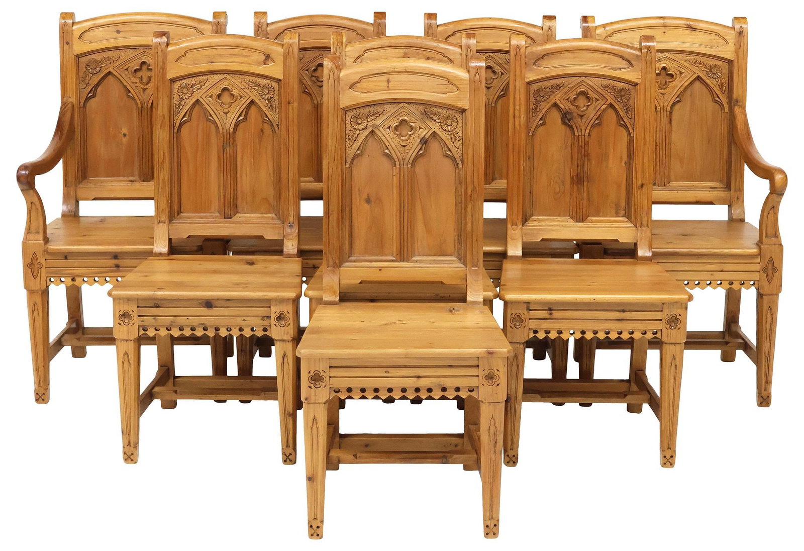 (8) KEENPINE GOTHIC STYLE CARVED PINE DINING CHAIRS: (lot of 8) Gothic style carved pine dining chairs, Keenpine, 20th c., each having arcaded back with central quatrefoil, flanked by floral motifs, rising on tapered legs, joined by H stretcher, some