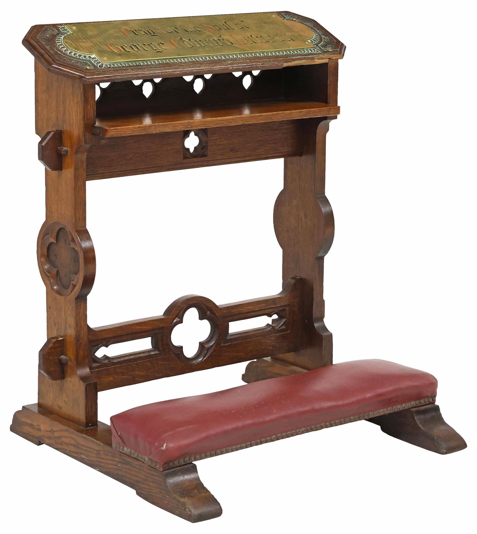 ENGLISH GOTHIC REVIVAL LEATHER & CARVED OAK PRAYER KNEELER: English Gothic Revival oak prie-dieu/ prayer kneeler, late 19th c., elongated octagonal elbow rest with inset brass plaque inscribed, "Pray for the Soul of George Edward Lawson," above pierced