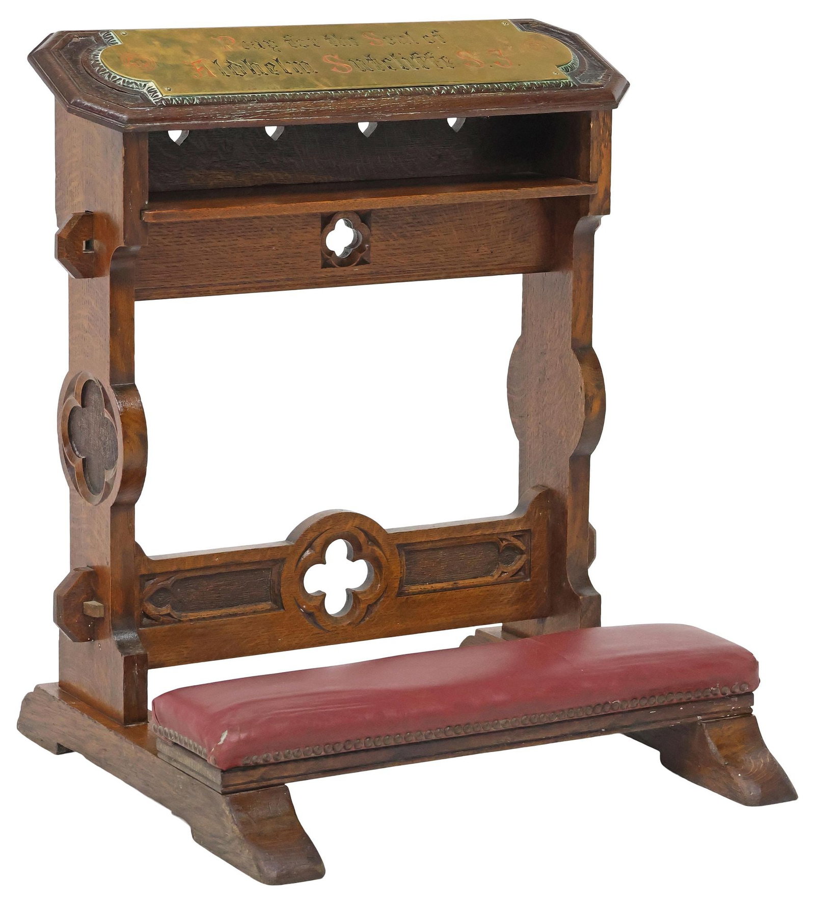 ENGLISH GOTHIC REVIVAL LEATHER & CARVED OAK PRAYER KNEELER: English Gothic Revival oak prie-dieu/ prayer kneeler, late 19th c., elongated octagonal elbow rest with inset brass plaque inscribed, "Pray for the Soul of Aldhelm Sutcliffe, S.J.," above pierced