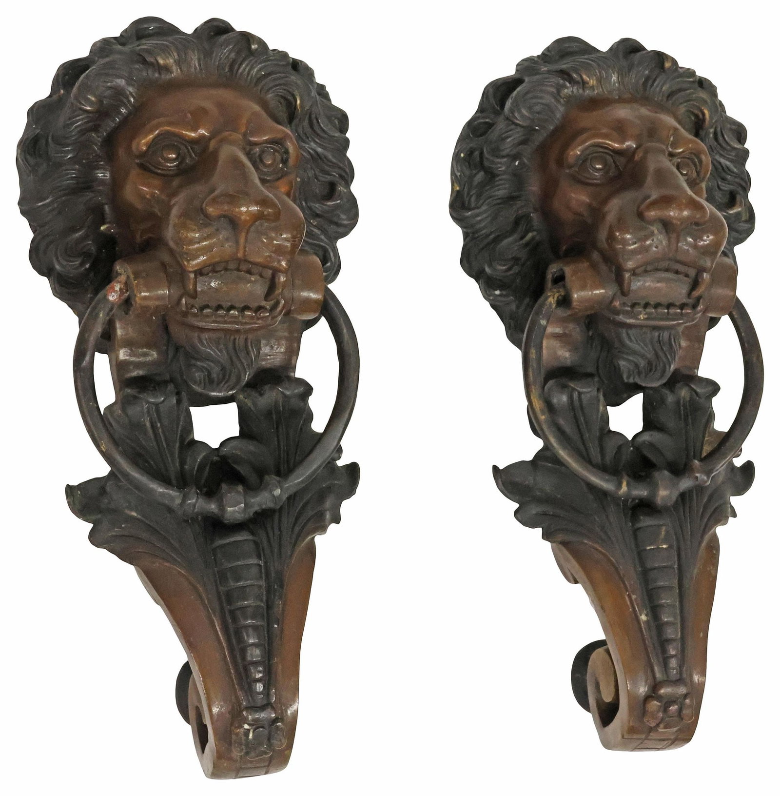 (2) ENGLISH PATINATED BRONZE LION MASK DOOR KNOCKERS: (pair) English patinated bronze door knockers, 20th c., each in the form of a lion mask with captured ring, above scrolled corbel, approx 15"h, 7"w, 5"d, 17.25lbs total