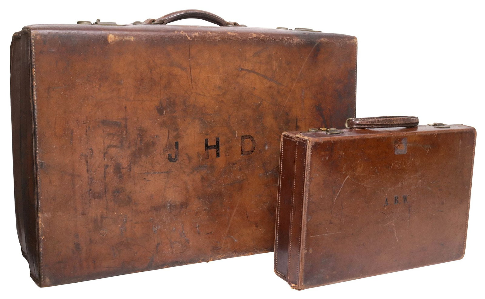 (2) ENGLISH LEATHER LUGGAGE, W.W. BRIDGE SUITCASE & BRIEFCASE: (lot of 2) English leather luggage, early 20th c., each with monogram and outer locking mechanism, including: (1) briefcase, with interior pocket, (1) "W.W. Bridge Portmanteau Bag" suitcase,