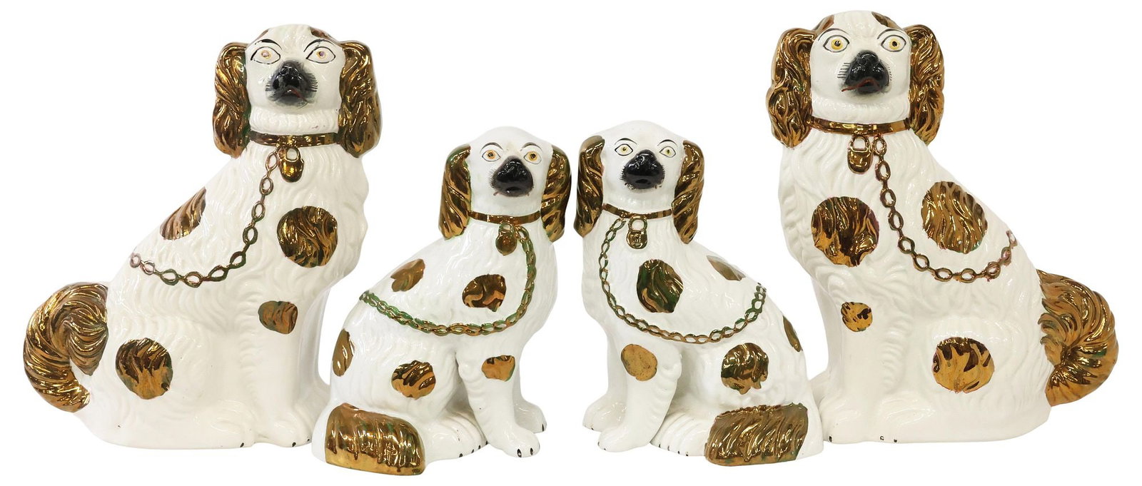 (4) ENGLISH STAFFORDSHIRE LUSTERED MANTEL DOGS: (lot of 4) English Staffordshire mantle dogs, early 20th c., comprising two pairs, each modeled as a seated spaniel, with painted features and copper lustered spots, largest: approx 12.5"h, 9.25"w, 5"