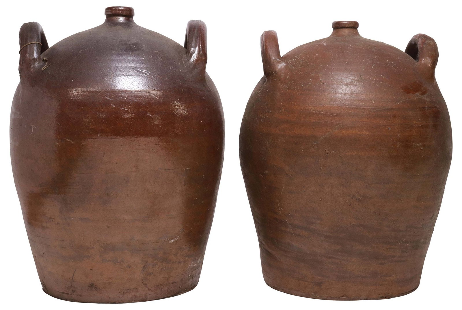 (2) LARGE FRENCH PROVINCIAL STONEWARE OIL JUGS: (lot of 2) French Provincial stoneware oil jugs, each having dual handles and tapering body, largest: approx 16.5"h, 11.75"w, 11.5"d, 32.5lbs total