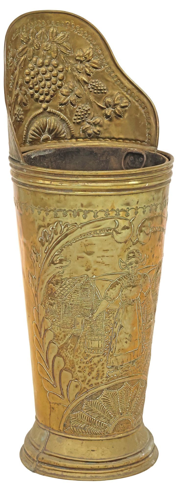ENGLISH EDWARDIAN BRASS REPOUSSE UMBRELLA / STICK STAND: English Edwardian brass umbrella/ stick stand, early 20th c., having raised lip with repousse grape cluster, above tapering body with chased scene depicting a milkmaid in rural village, with metal lin