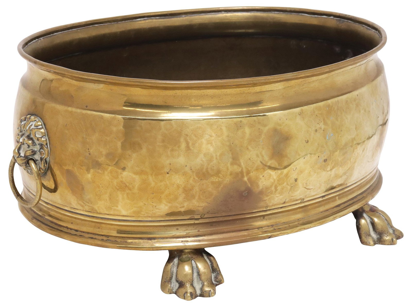 ENGLISH BRASS OVULAR PLANTER / JARDINIERE ON PAW FEET: English brass planter/ jardiniere, early 20th c., having ovular body with dual lion mask drop ring handles, ending on paw feet, stamped "Made in England" underfoot, approx 6.5"h,