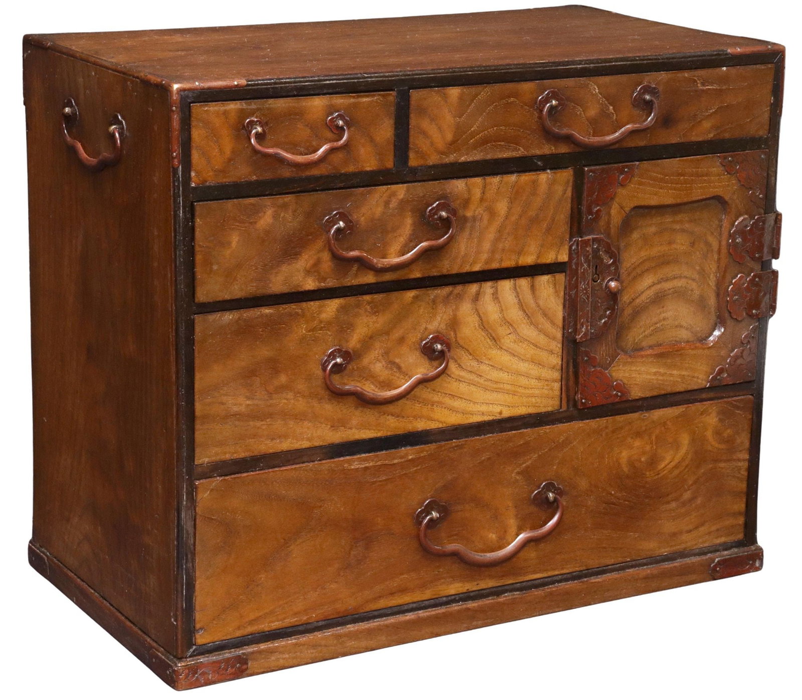 JAPANESE MINIATURE HARDWOOD KO DANSU CABINET: Japanese hardwood miniature chest/ ko dansu cabinet, 20th c., fitted with an arrangement of five drawers of varied size, paneled cabinet door opening to two additional drawers, the case ornamented