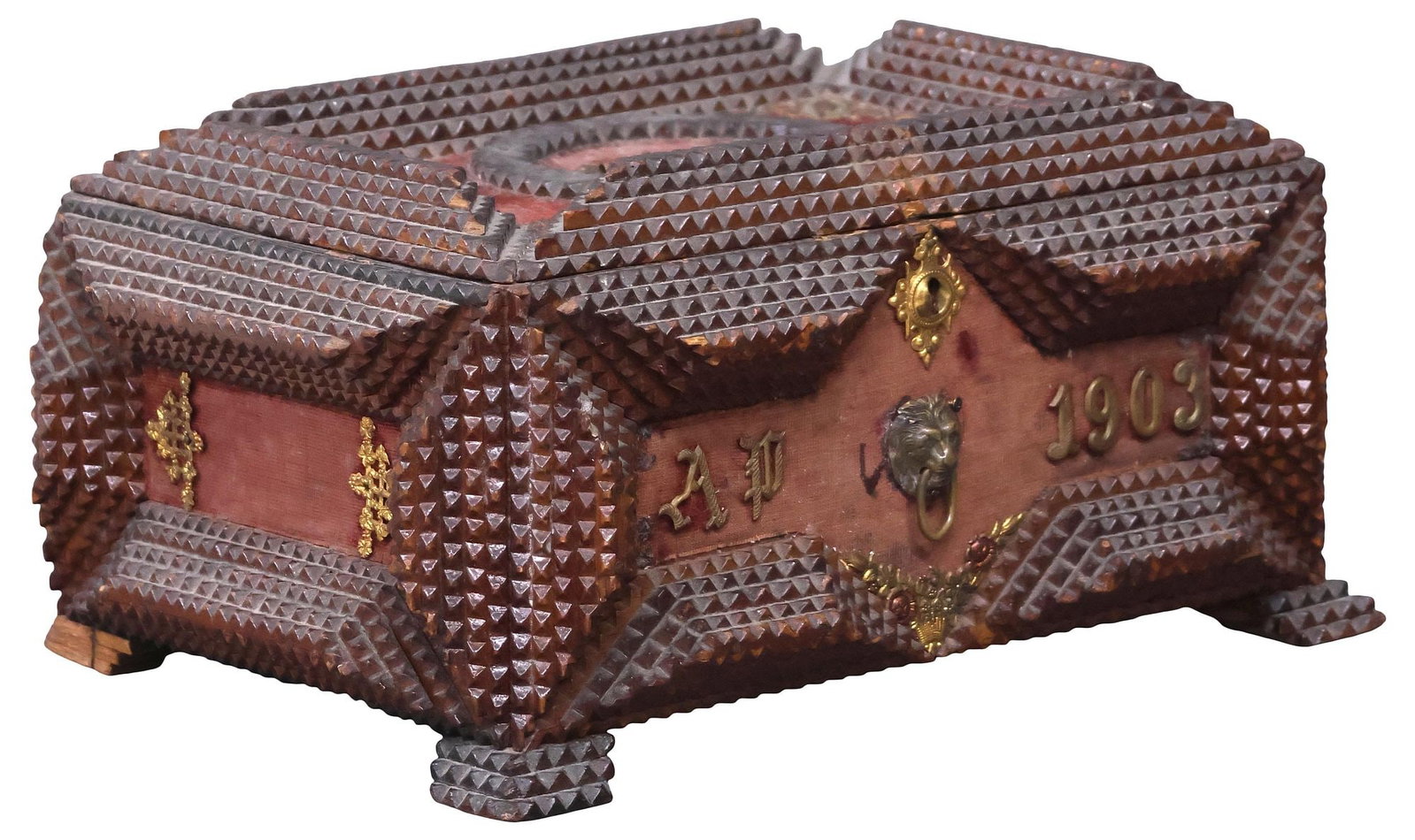ENGLISH TRAMP ART CHIP CARVED & METAL-MOUNTED WOOD TABLE BOX: English tramp-art table box, early 20th c., hinged rectangular case with fabric liner and patinated metal mounts, lower facade initialed AP and dated 1903, open interior, on short feet, overall worn