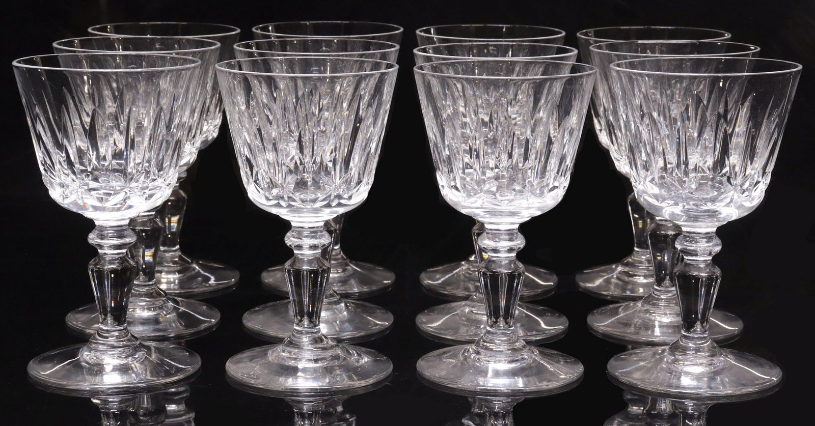 (12) FRENCH BACCARAT "ILE DE FRANCE" CUT CRYSTAL PORT WINE GLASSES: (lot of 12) French Baccarat cut glass crystal port wine glasses, in the "Ile de France" pattern, acid etched maker's mark underfoot, 4 .5"h, 2.5" diam, 4.25lbs total **Note: Five lots of Baccarat drin