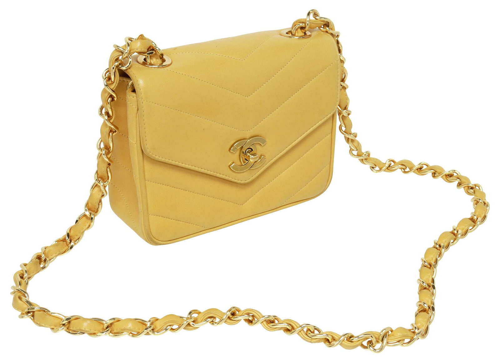 CHANEL 'CHEVRON SINGLE FLAP' YELLOW LEATHER SHOULDER BAG: Chanel "Chevron Single Flap" shoulder bag, in stitched yellow leather, with gold-tone metal hardware, front flap closure with interlocking CC logo clasp, back slip pocket, interlaced chain and leather