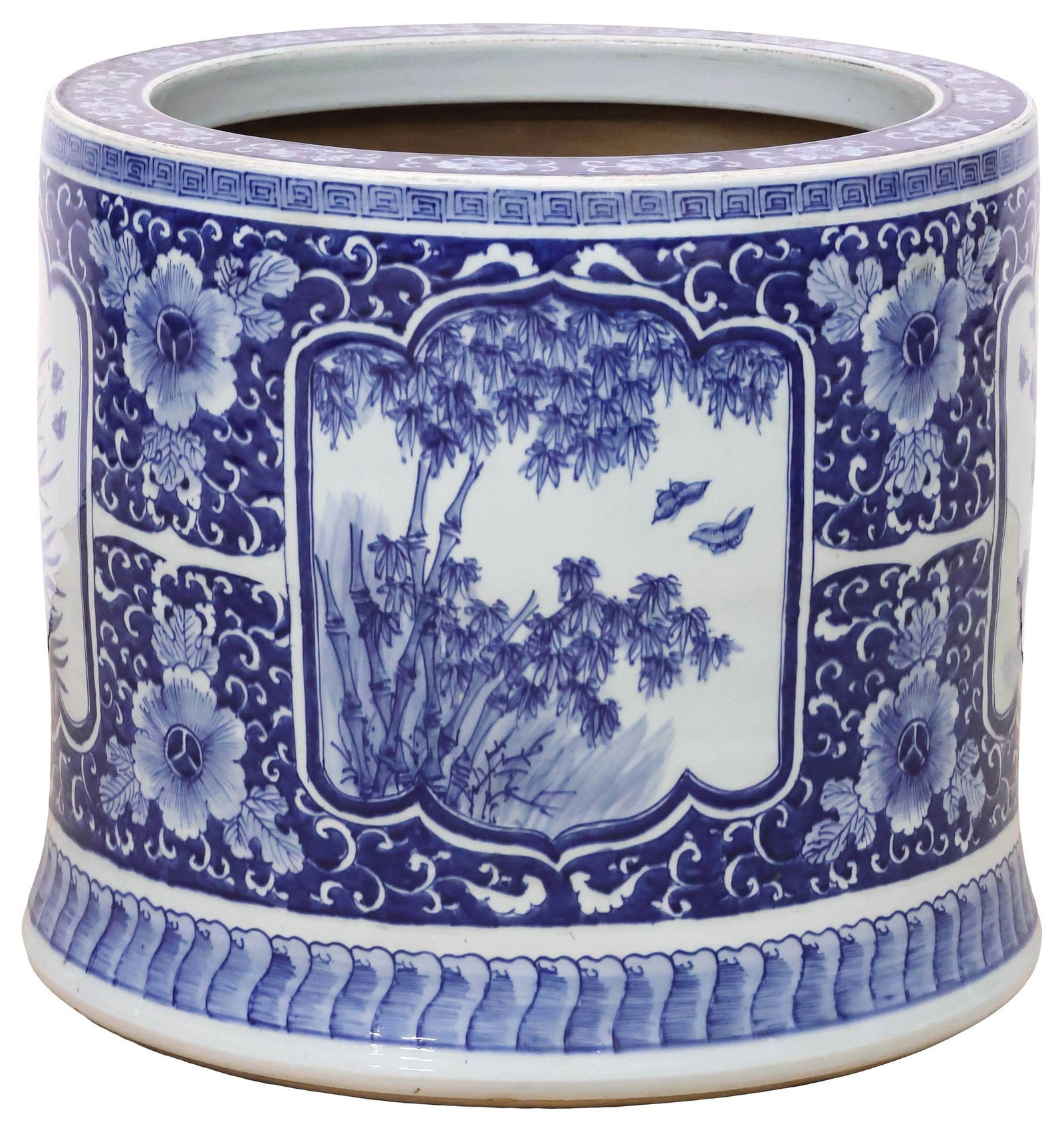 JAPANESE BLUE & WHITE PORCELAIN PLANTER / HIBACHI BRAZIER: Japanese blue and white porcelain jardiniere/ planter or hibachi brazier, a dense floral and foliate ground, reserved with landscape scenes, approx 19"h, 21"diam, 70lbs