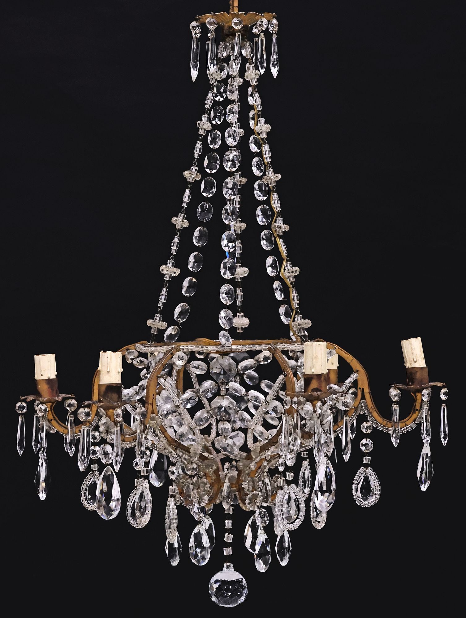 ITALIAN GILT IRON & CRYSTAL-BEADED 6-LIGHT CHANDELIER: Italian gilt-iron six-light chandelier, 20th c., circular frame with crystal beadwork, hung with faceted drops and prisms, issuing scrolled arms, terminating at floriform bobeche fitted with short fau