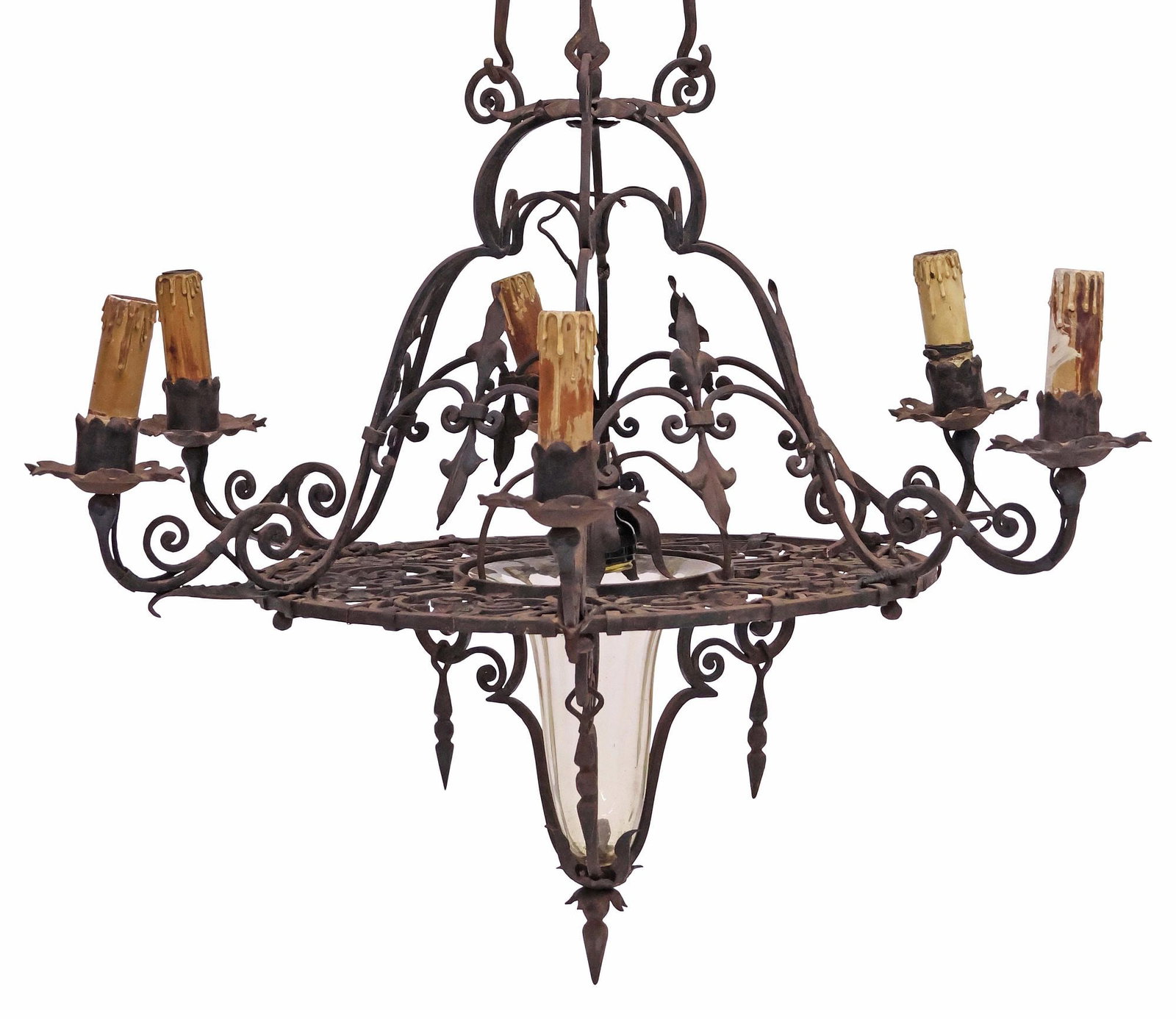 GOTHIC REVIVAL WROUGHT IRON & GLASS 7-LIGHT CHANDELIER: Gothic Revival wrought iron seven-light chandelier, early 20th c., scrolled frame with foliate and trefoil motifs, encircling central light above fluted glass trumpet shade, scroll arms terminating at