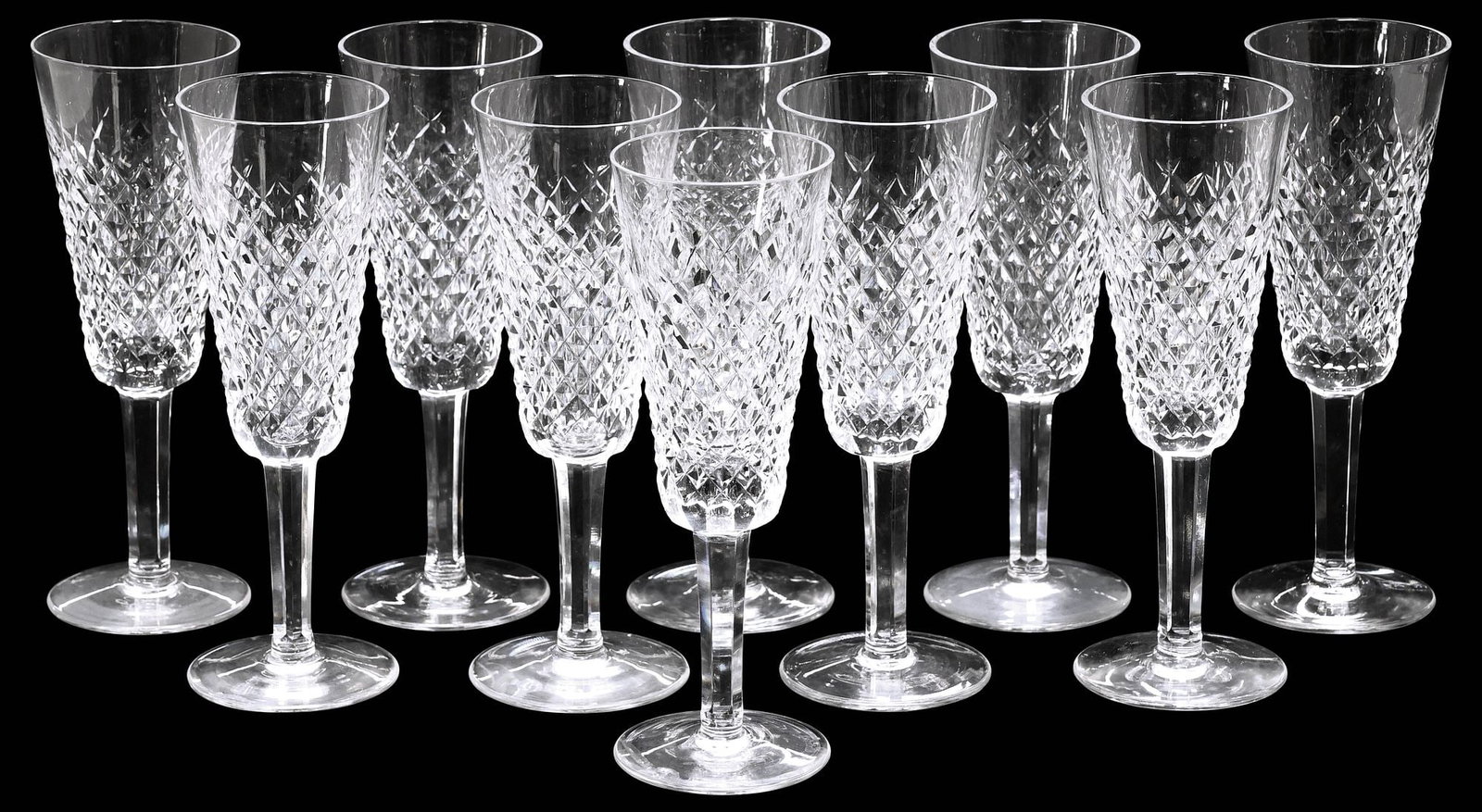 (10) WATERFORD 'ALANA' CUT CRYSTAL CHAMPAGNE FLUTES: (lot of 10) Waterford cut crystal champagne flutes, in the "Alana" pattern, multi-sided stem, each with acid-etched mark underfoot, approx 7 3/8"h, 2.5"diam, 6.5lbs total **Provenance: The collection 