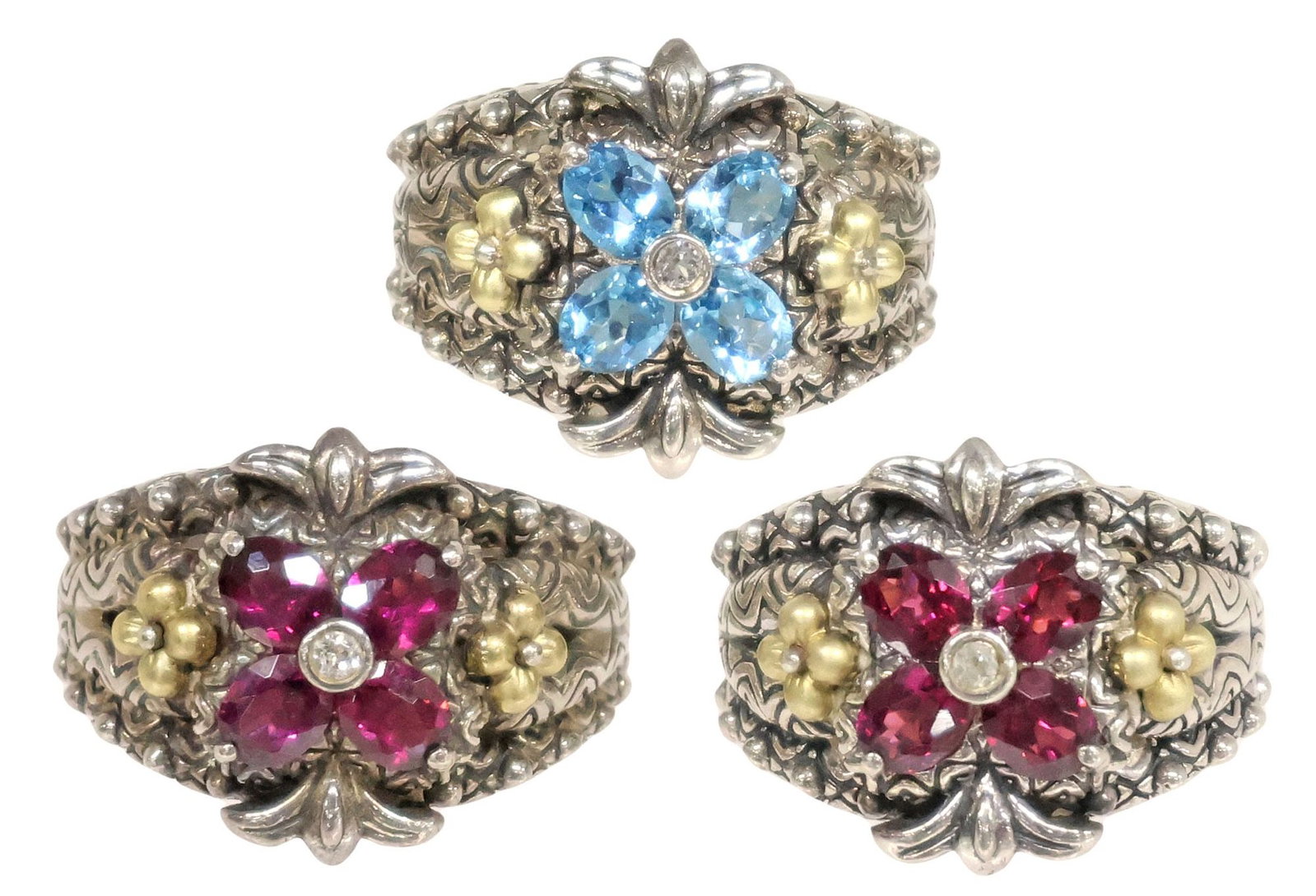 (3) BARBARA BIXBY 'LOTUS' STERLING, 18K YELLOW GOLD, & GEMSTONE RINGS: (lot of 3) Estate costume jewelry sterling silver and 18kt yellow gold "Lotus" rings, Barbara Bixby, stampwork and filigree bands with beaded trim, central four-petal flower with varied gemstones, hal