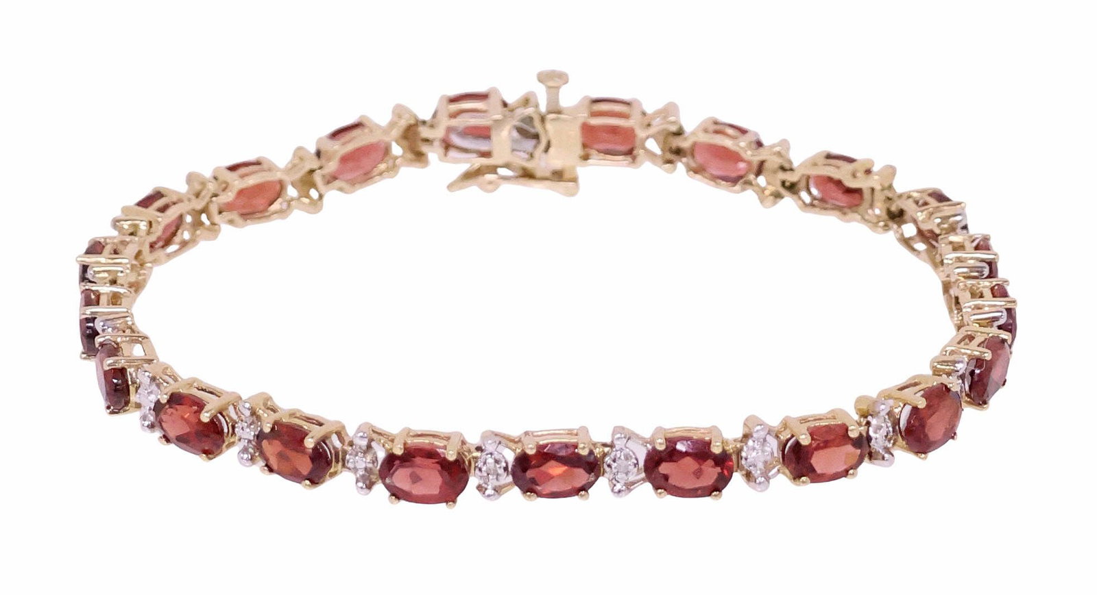 ESTATE 10KT TWO-TONED GOLD & 11CTTW GARNET LINE BRACELET: Estate 10kt yellow gold and gemstone line bracelet, prong-set with (twenty-one) oval cut garnets, approx 11cttw, alternating with white gold beadwork, box clasp with safety latch, hallmarked 10K, mark