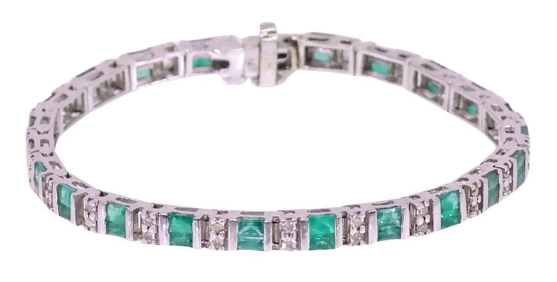 ESTATE 14KT WHITE GOLD, 2.76CTTW EMERALD, & DIAMOND LINE BRACELET: Estate 14kt white gold and gemstone line bracelet, comprising (forty-six) emeralds, approx 2.76cttw, and small diamonds, approx 0.28cttw, average color: I, average clarity: I, box clasp with safety la