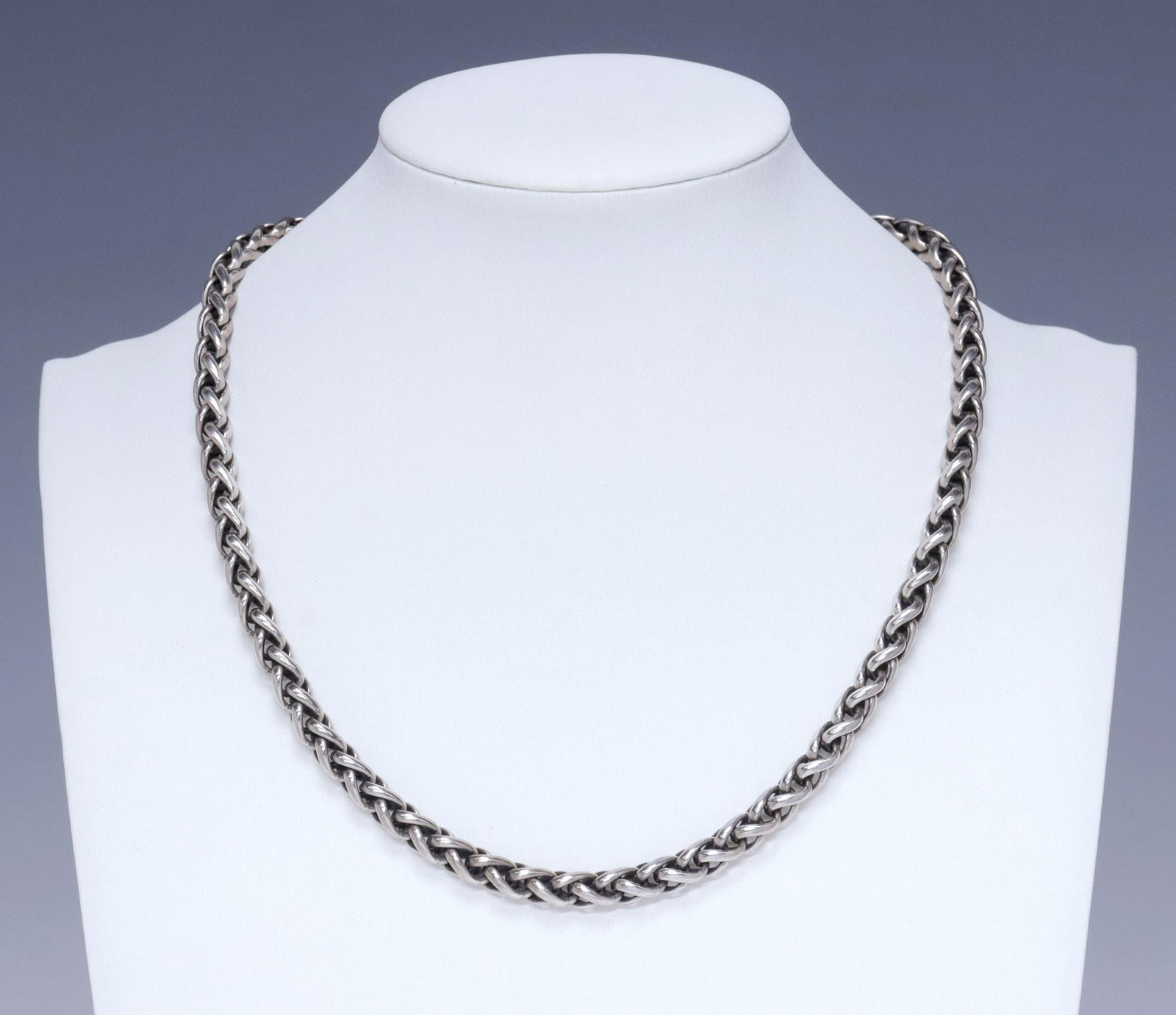 ESTATE DAVID YURMAN STERLING SILVER & 18KT GOLD WHEAT CHAIN NECKLACE: Estate designer sterling silver and 18kt yellow gold necklace, David Yurman, braided wheat chain, with gold lobster claw clasp, marked D.Y. 925 and 750 at hook closure, approx 18"l, 61.6 grams (inclus