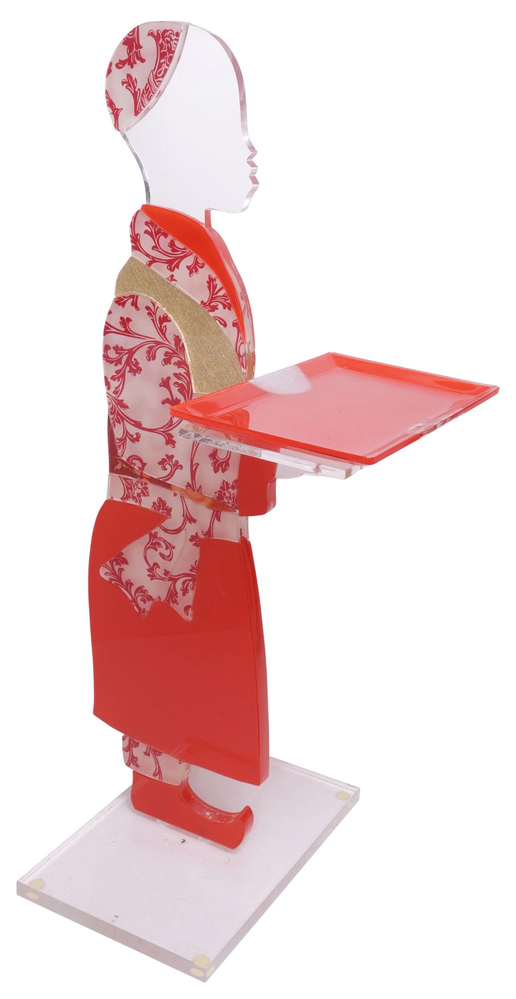 DESIGNER SPISANI COLORED ACRYLIC FIGURAL SILENT BUTLER WITH TRAY: Contemporary Italian acrylic silent butler, Spisani, Ferrara, 21st c., modeled as the silhouette of a boy in profile, acrylic body encasing colored foils and printed patterning including red, foliate,