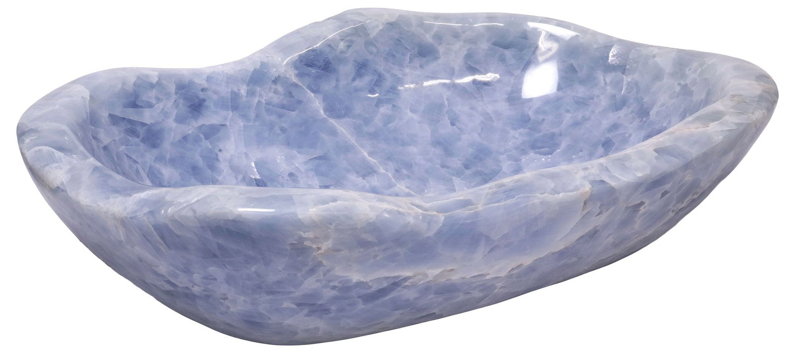 LARGE GEOLOGICAL NATURAL EDGE PALE BLUE STONE BOWL, 20.25"W: Large geological polished stone bowl, likely blue calcite, the pale blue vessel of organic shape with free-form undulating edge, typical professional stabilized fissures, small chip to edge, approx