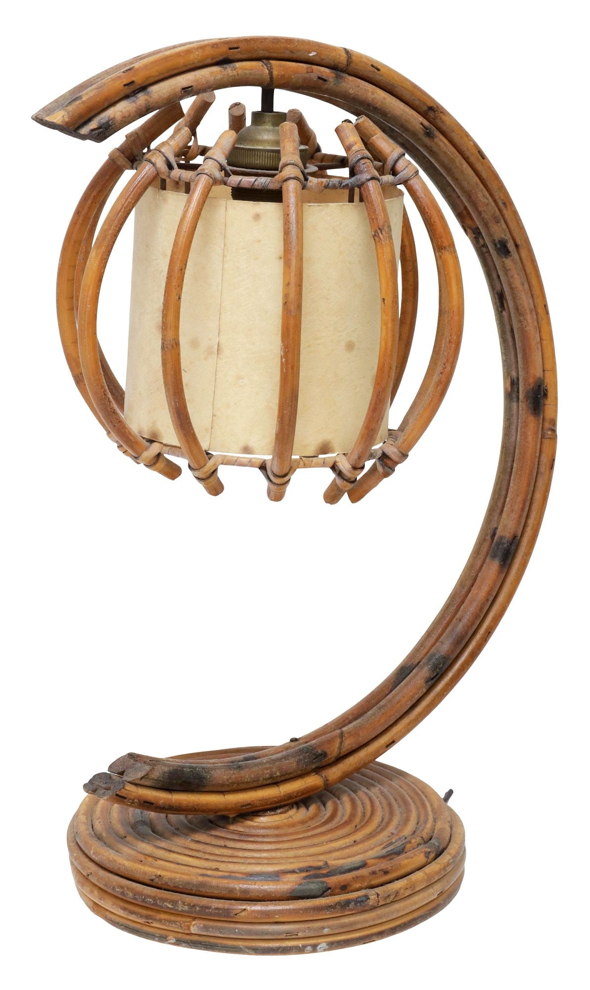 FRENCH LOUIS SOGNOT (ATTRIB.) MID-CENTURY BAMBOO & RATTAN TABLE LAMP: French mid-century bamboo and rattan single-light table lamp, attributed to Louis Sognot (French, 1892-1970), c.1960s, spherical cage with white drum shade, on arched bentwood frame, terminating on ci