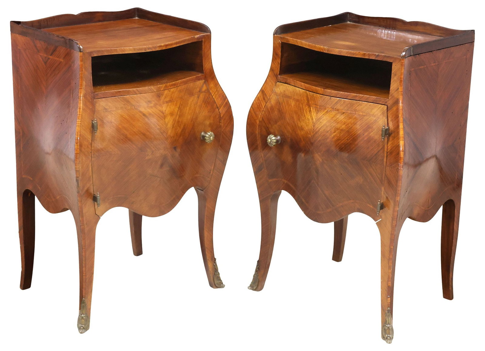(2) FRENCH LOUIS XV STYLE MATCHED VENEER BOMBE BEDSIDE CABINETS: (pair) French Louis XV style bombe nightstands, early 20th c., each finished in matched mahogany veneers, with banded stringwork trim, having serpentine top with three-quarter gallery, above open comp