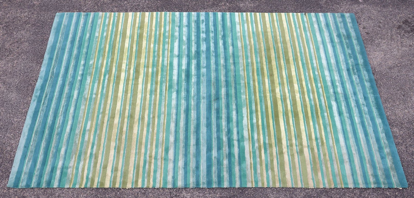 DESIGNER MISSONI FOR ROCHE BOBOIS 'ROCKFORD' STRIPED RUG, 10'4" X 6'5.5": Estate designer "Rockford" contemporary striped rug, Missoni Home for Roche Bobois, in the "Petrolio Multicolor" colorway, retaining maker's labels, approx 10'4"l, 6'5.5" **Provenance: Treasures from 