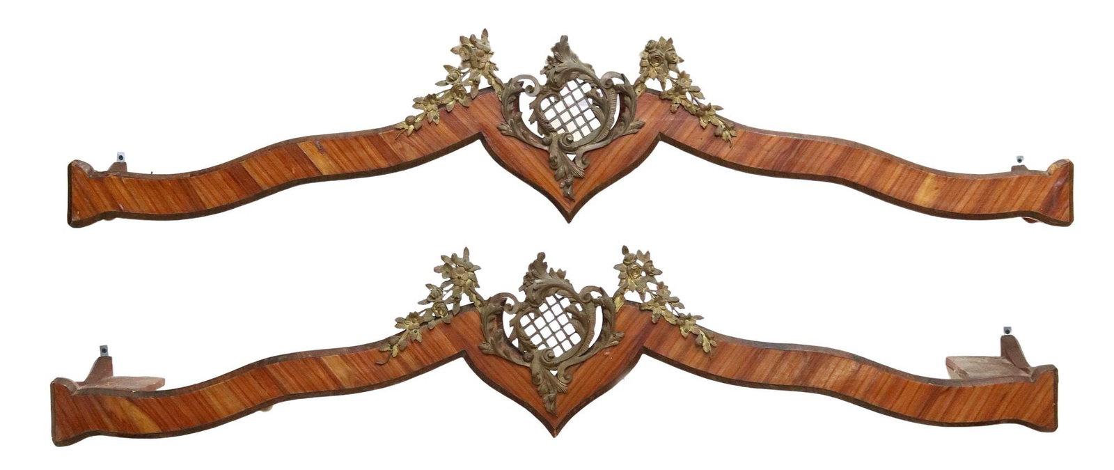 (2) FRENCH LOUIS XV STYLE MAHOGANY & METAL PELMETS / VALENCES: (pair) French Louis XV style mahogany valences/ pelmets, early 20th c., having patinated metal rocaille crest, with lattice design and floral swags, approx 12.5"h, 62.75"w, 12.25"d **Provenance: Treas