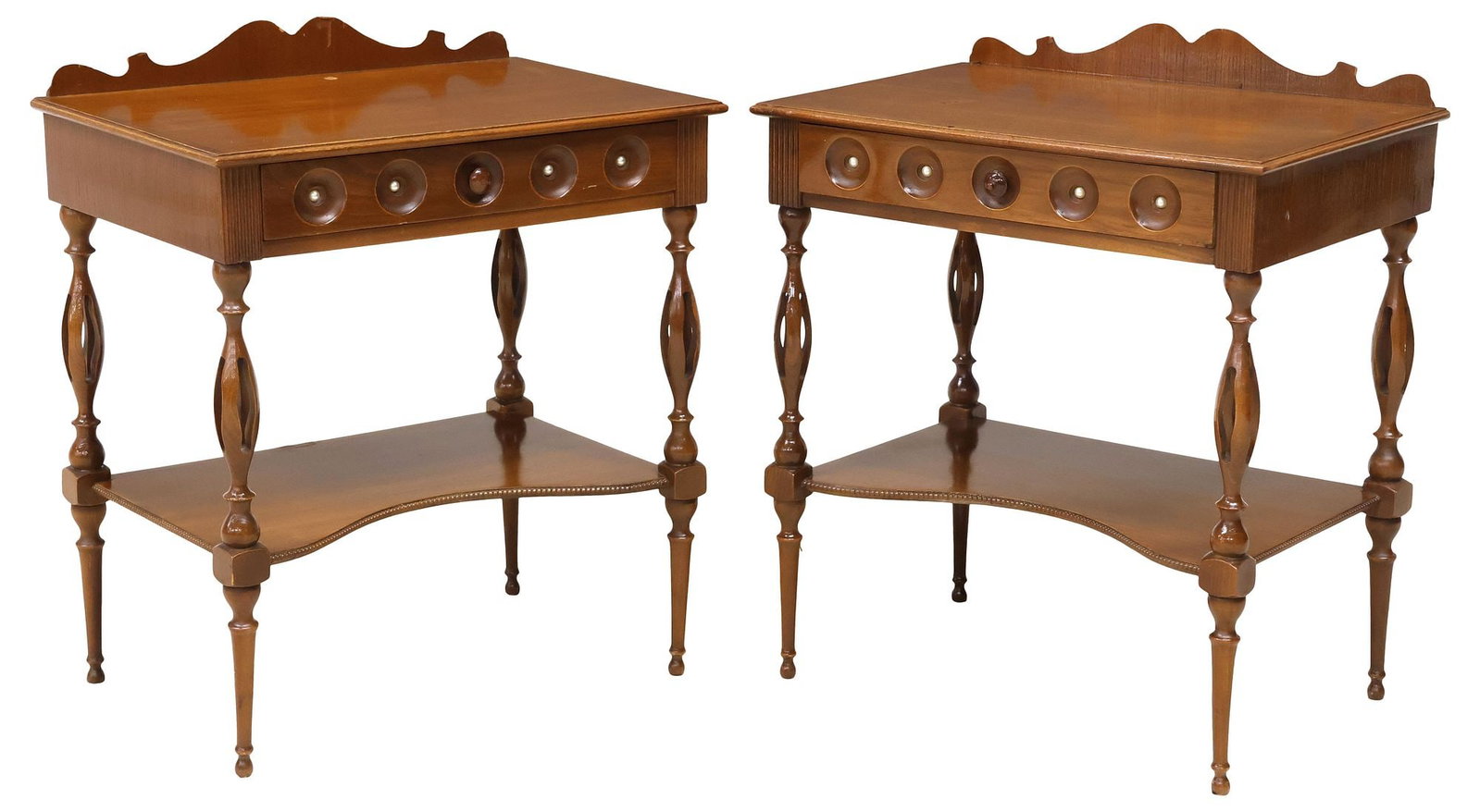 (2) ITALIAN MID-CENTURY MODERN TEAK 1-DRAWER NIGHTSTANDS: (pair) Italian mid-century modern teak nightstands, c.1960s, each having single drawer with five recessed carved roundels, over open shelf, rising on turned supports with pierced accents, approx 25"h,