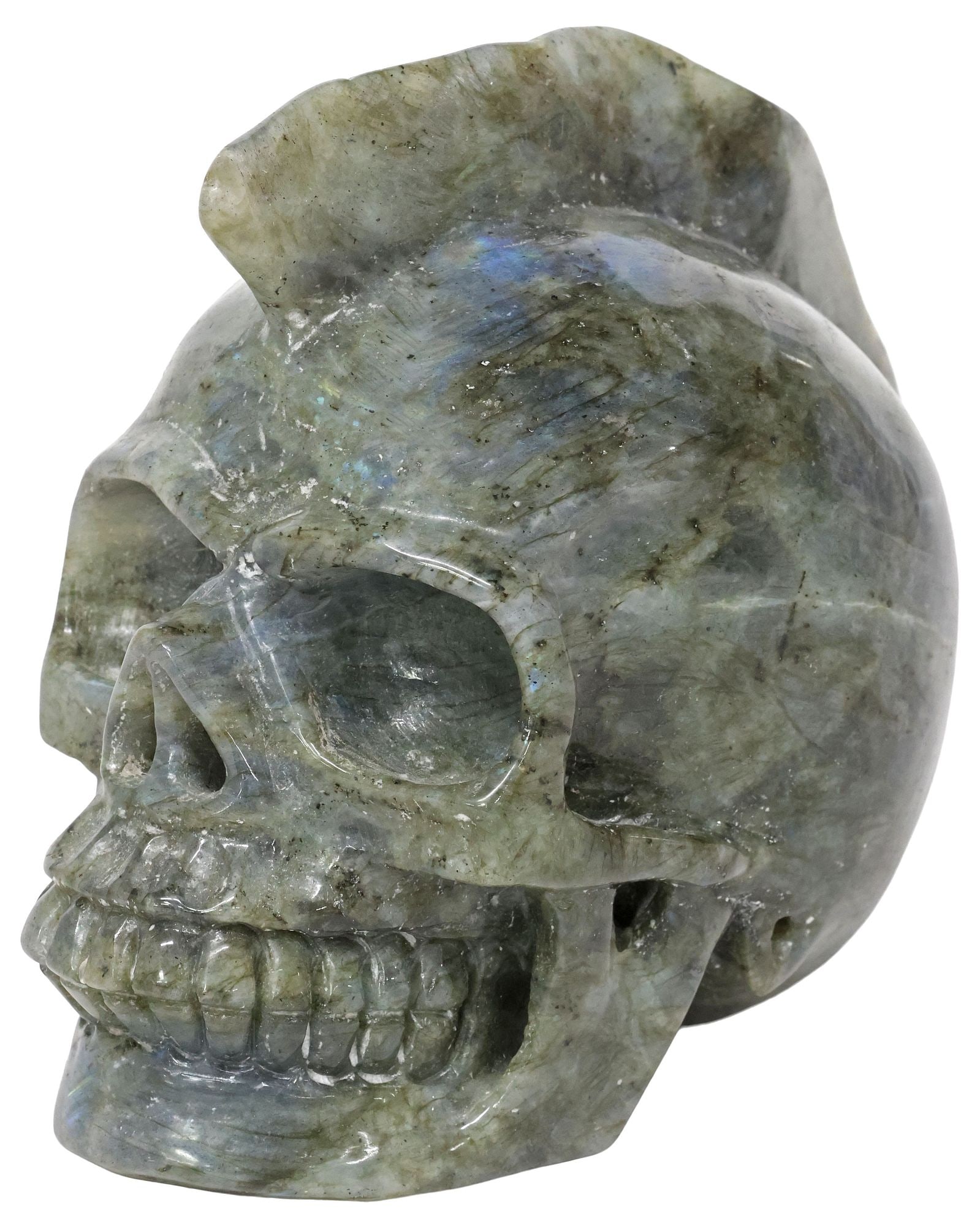 CARVED LABRADORITE MODEL OF A HUMAN SKULL WITH MOHAWK: Carved geological labradorite model of a human skull, with a mohawk, and flash inclusions, approx 4.5"h, 3.5"w, 5.5"d, 3lbs **Provenance: Treasures from the vaults of a Dallas designer**
