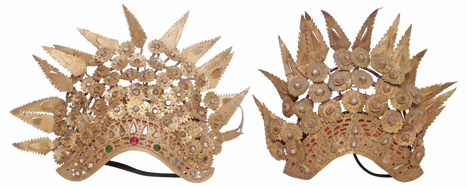 (2) BALINESE GILT-PAINTED & GLASS-SET RAWHIDE GELUNGAN HEADPIECES: (lot of 2) Indonesian gilt-painted rawhide ceremonial headdress or gelungan, Bali, each having tiered bentwood frame affixed with pierced hide geometrics and scalloped florals, with bezel-set mirrored